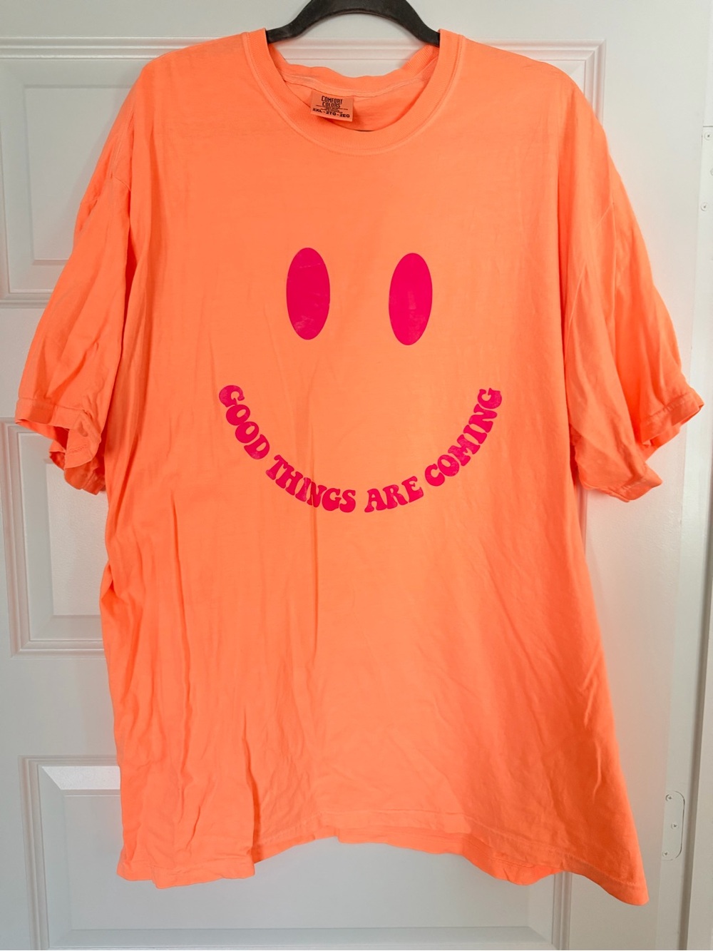 Comfort Colors Neon Orange Short Sleeve Tee with Pink Smiley Graphic